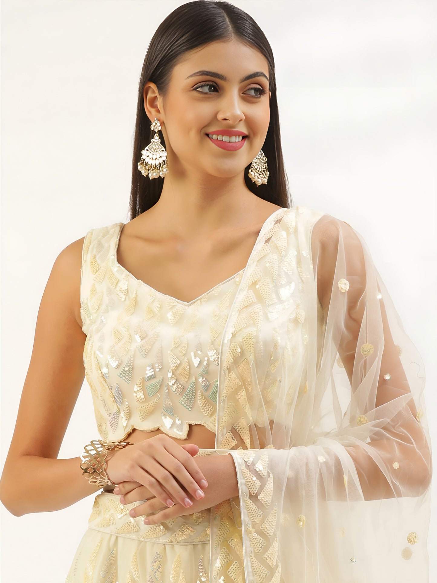 NET FABRIC HEAVY SEQUINNED WORK LEHENGA  CHOLI AND DUPATTA GOLDEN COLOUR