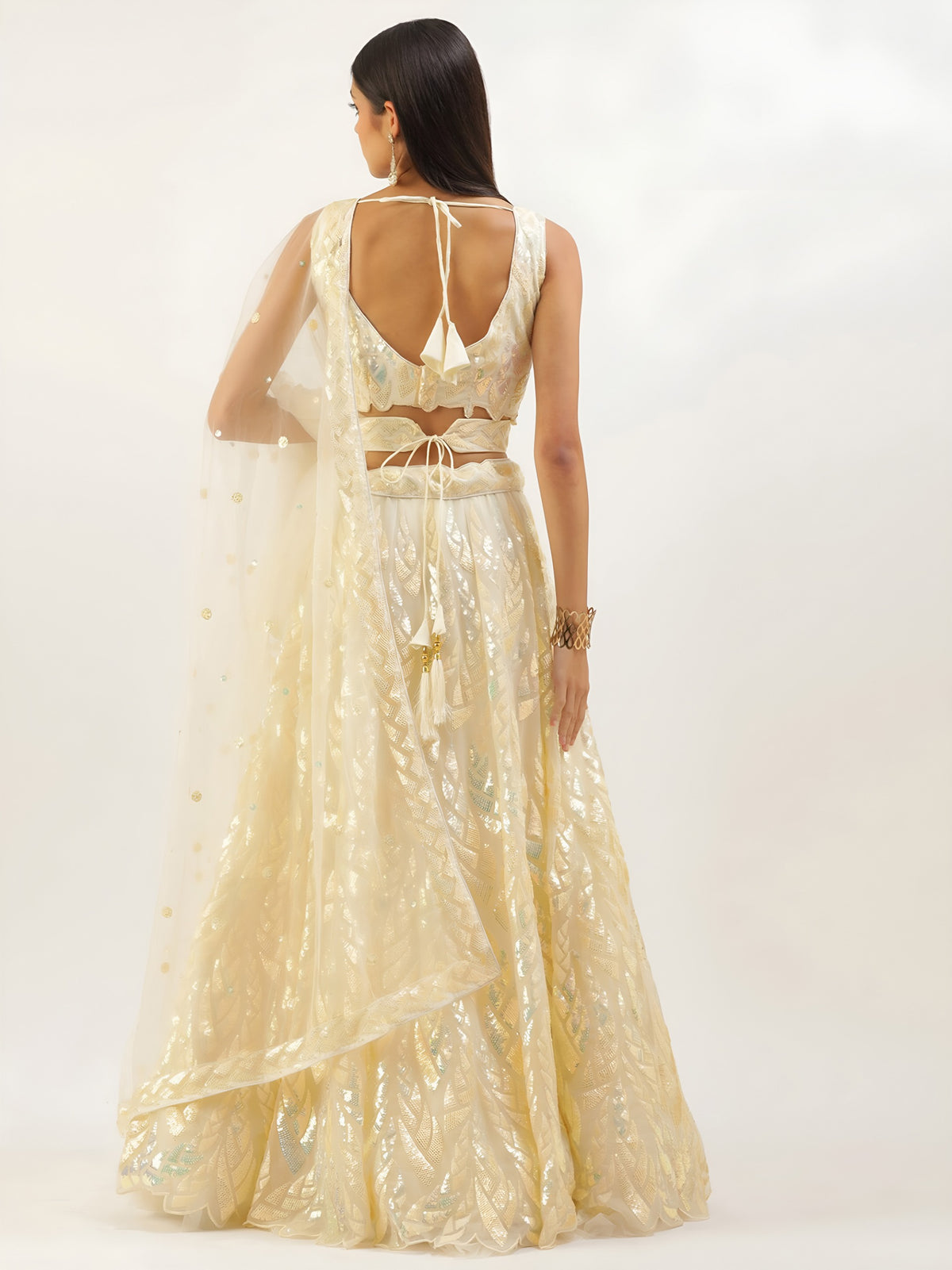 NET FABRIC HEAVY SEQUINNED WORK LEHENGA  CHOLI AND DUPATTA GOLDEN COLOUR